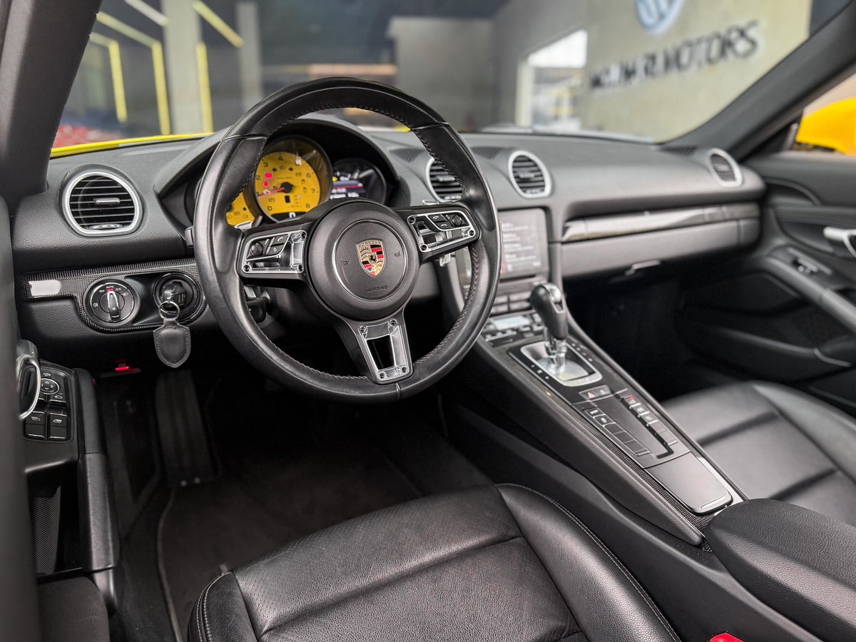 Porsche 718 Cayman 2019 — foto 6 de 15